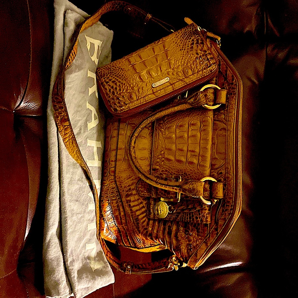 Brahmin tan in color near new if your a Brahmin lover this is the bag for you
